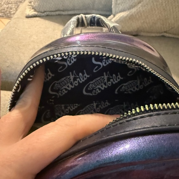 Loungefly SeaWorld Iridescent Purple Backpack - Picture 8 of 13